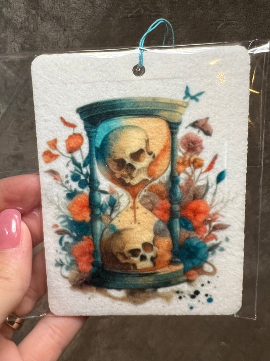 Hour Glass Two Skulls With Flowers